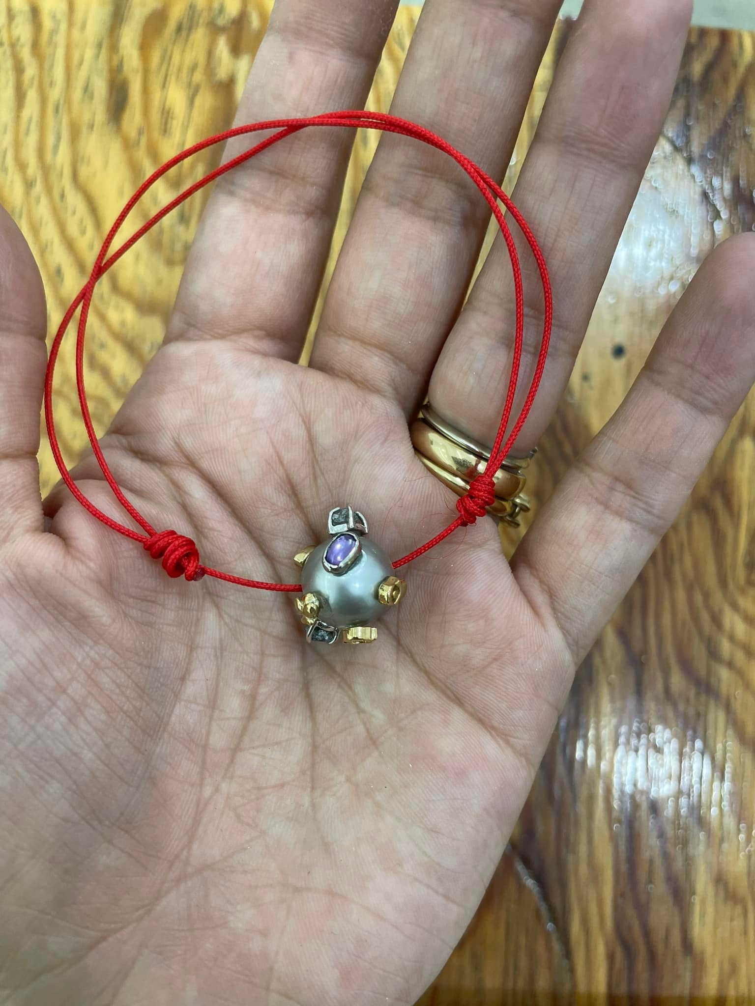 Dije o pulsera Amuletos